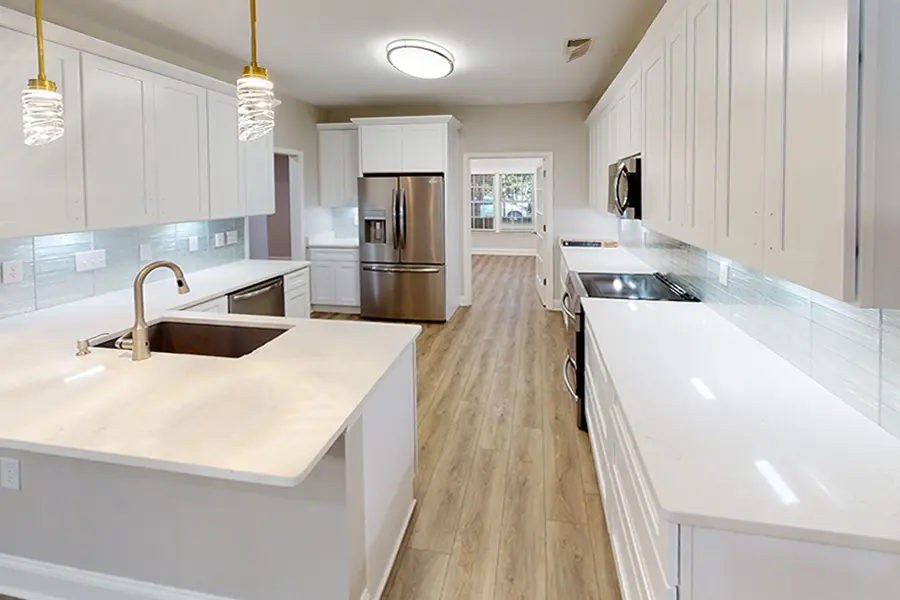 kitchen with white counters and cabinets