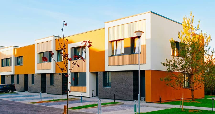 modern townhomes with parking and lawn